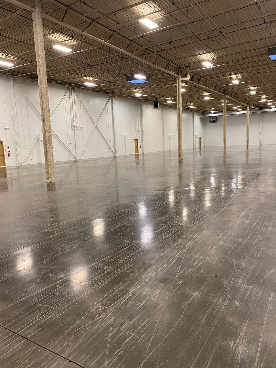 Polish. Protect. Perform. | Expert Concrete Warehouse Floor Cleaning & Sealing in Harrisburg & York, PA